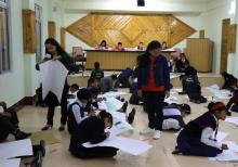 Staff of Meghalaya Biodiversity Board assist the students during painting and drawing competition