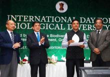 Dr. Shreeranjan, IAS, Chairman of Meghalaya Biodiversity Board presenting the award to Damewanhi Rymbai