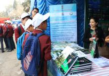 Staff of Meghalaya Biodiversity Board distribute posters, pamplets etc to school students
